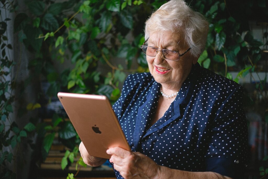 Old lady with ipad